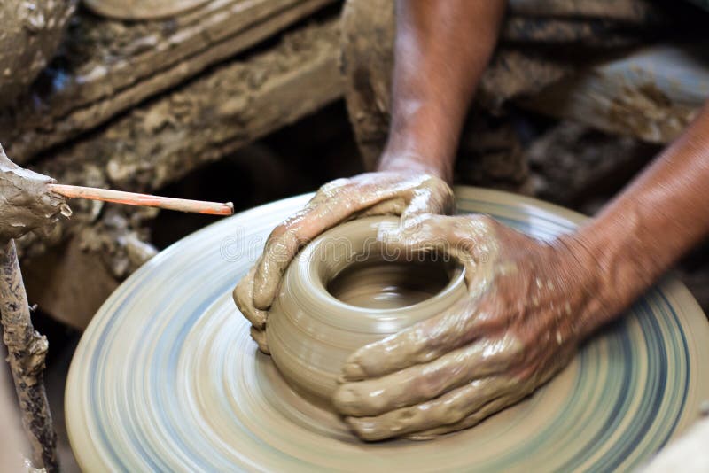 Potter S Wheel and Hands of Craftsman Hold a Jug Stock Photo Image of
