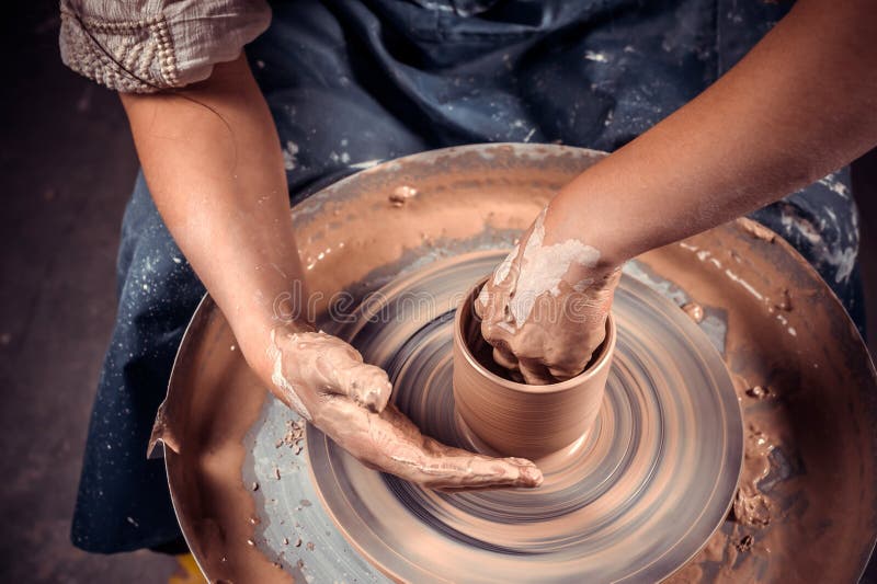 The Potter Works on a Potter& X27;s Wheel. Concept Handmade,