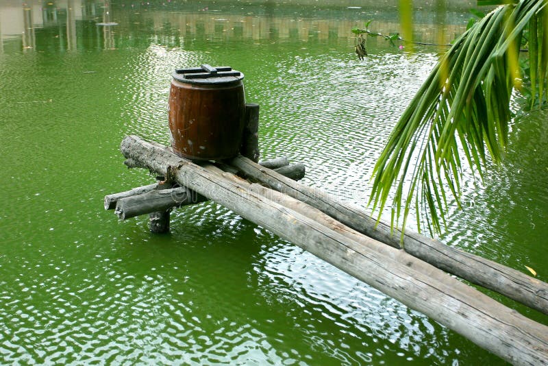 Pottery jar and wooden bridge