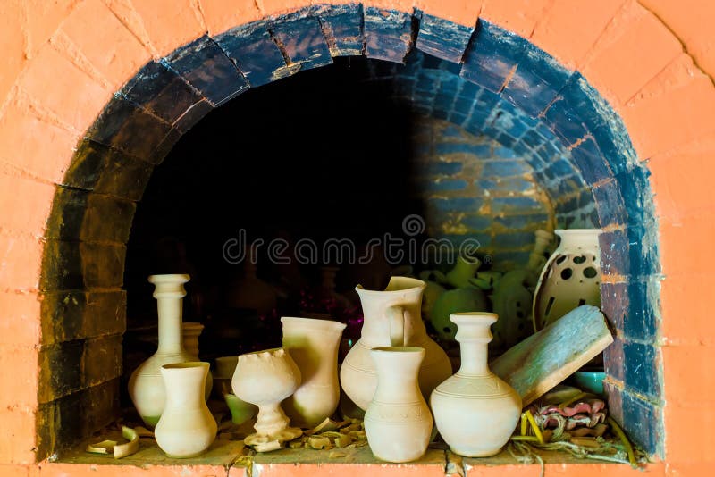 Pottery in a kiln stock image. Image of earthenware, decorative 68744189