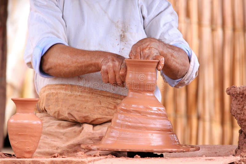 Pottery making stock image. Image of hands, closeup, wheel 27841213