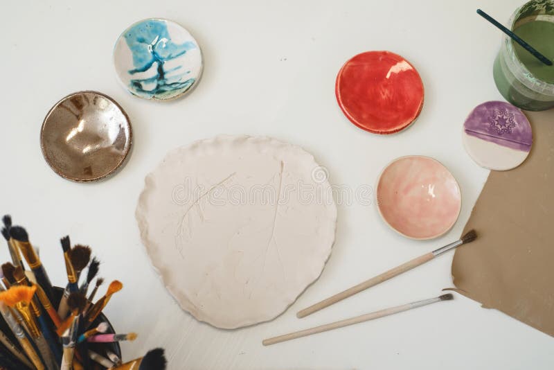 Pottery Plate before Glazing, Painting on Plate in Top View