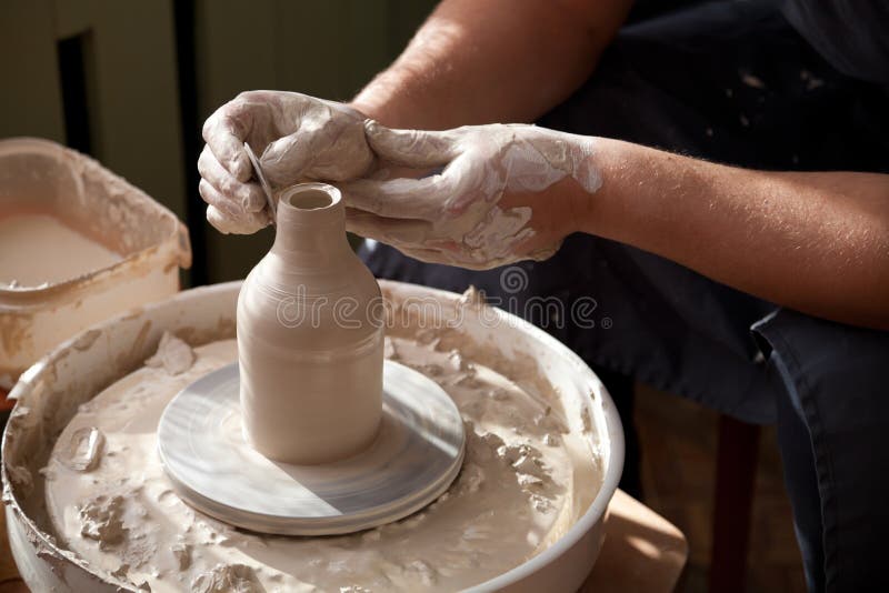 Pottery throwing wheel stock image. Image of earthen 21601547