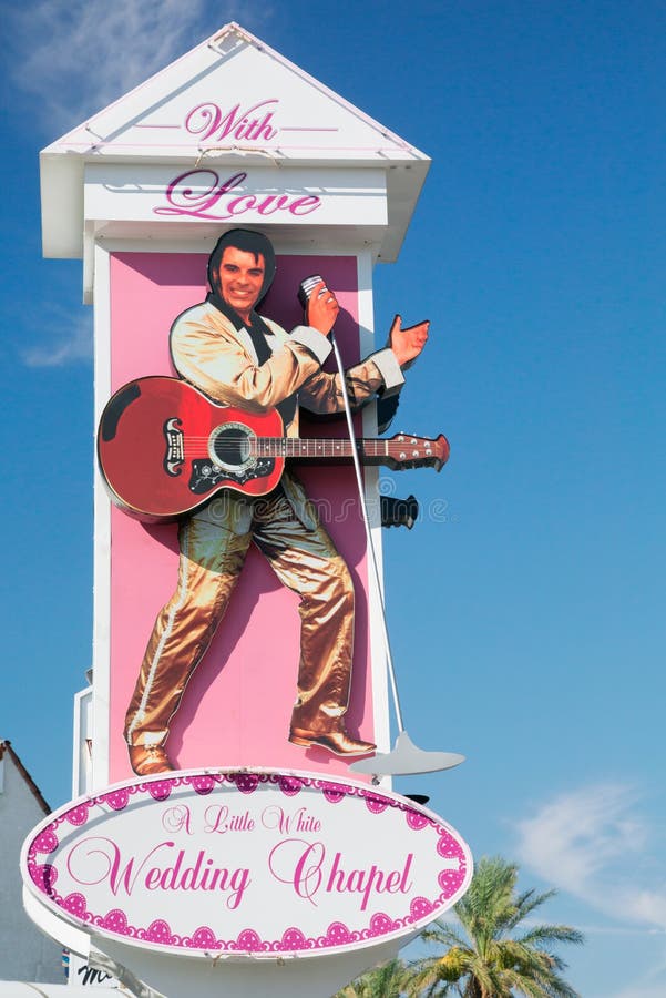 Las Vegas, Nevada, USA - August 07, 2013: Little White Wedding Chapel sign with an illustration of a singer looking like Elvis Presley. Las Vegas, Nevada, USA - August 07, 2013: Little White Wedding Chapel sign with an illustration of a singer looking like Elvis Presley.