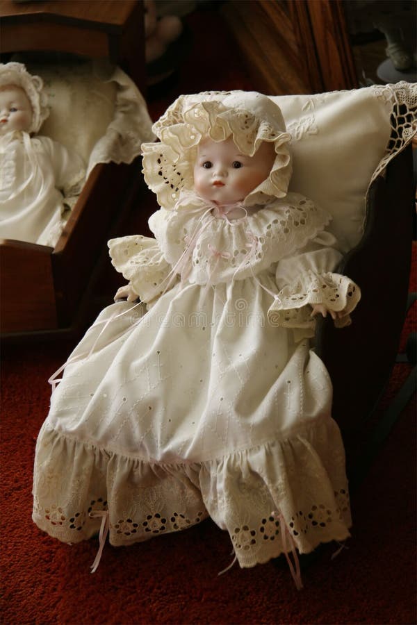 Victorian Antique Doll in Old Fashioned Dress. Victorian Antique Doll in Old Fashioned Dress