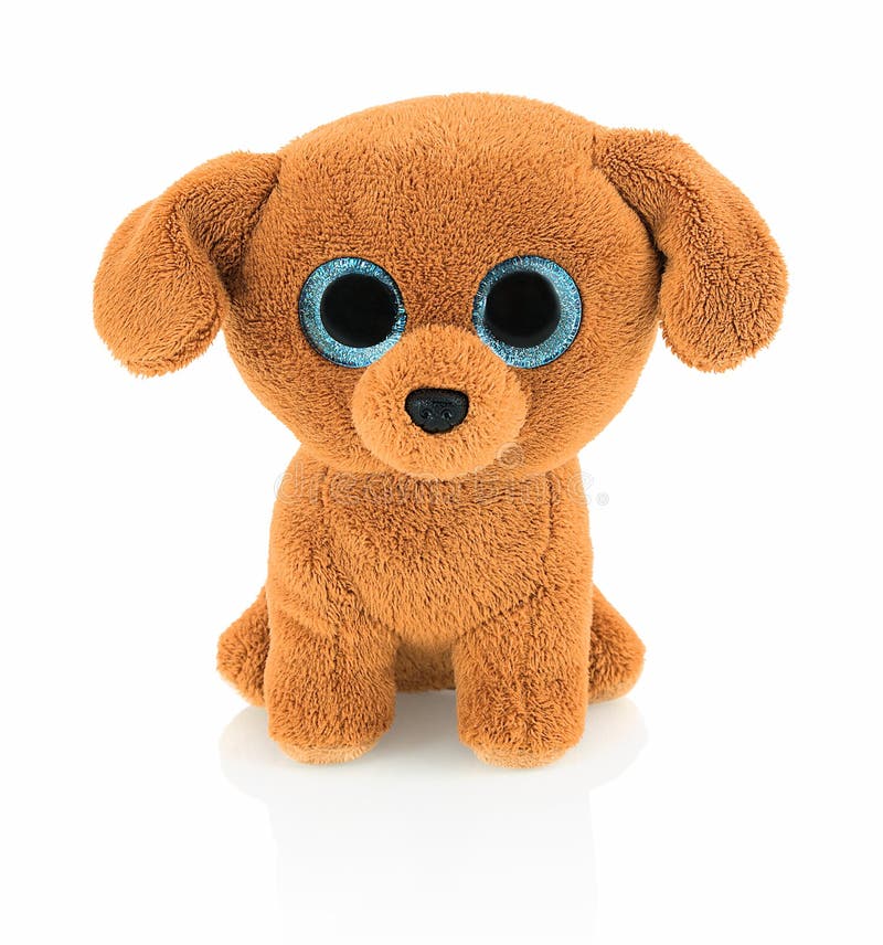 Poupée mignonne de chien avec des yeux bleus sur le fond blanc avec la réflexion d'ombre Jouet brun lumineux espiègle de chien se images libres de droits Poupée mignonne de chien avec des yeux bleus sur le fond blanc avec la réflexion d'ombre Jouet brun lumineux espiègle de chien se images libres de droits