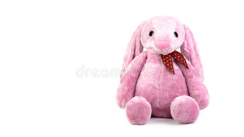 Poupée rose de lapin avec de grandes oreilles d'isolement sur le fond blanc Peluche mignonne et fourrure pelucheuse pour des enfa images stock Poupée rose de lapin avec de grandes oreilles d'isolement sur le fond blanc Peluche mignonne et fourrure pelucheuse pour des enfa images stock