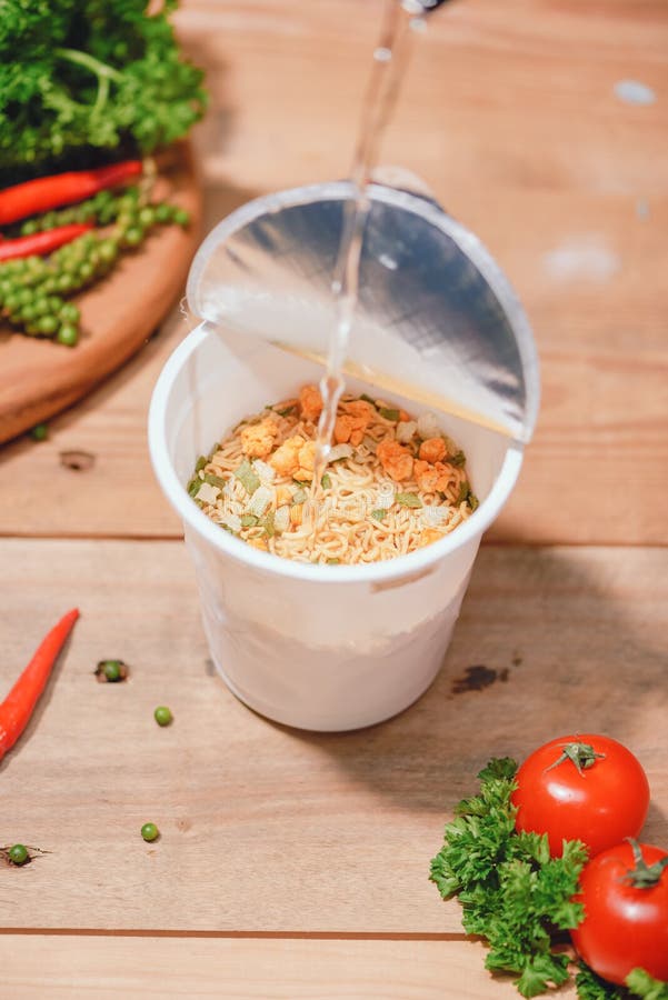 Pour Hot Water and Eat Cup Noodles. Junk Food Instant Noodles are
