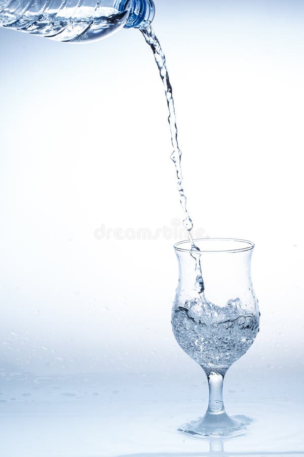 Pour water isolated stock photo. Image of blue, glass 74962458