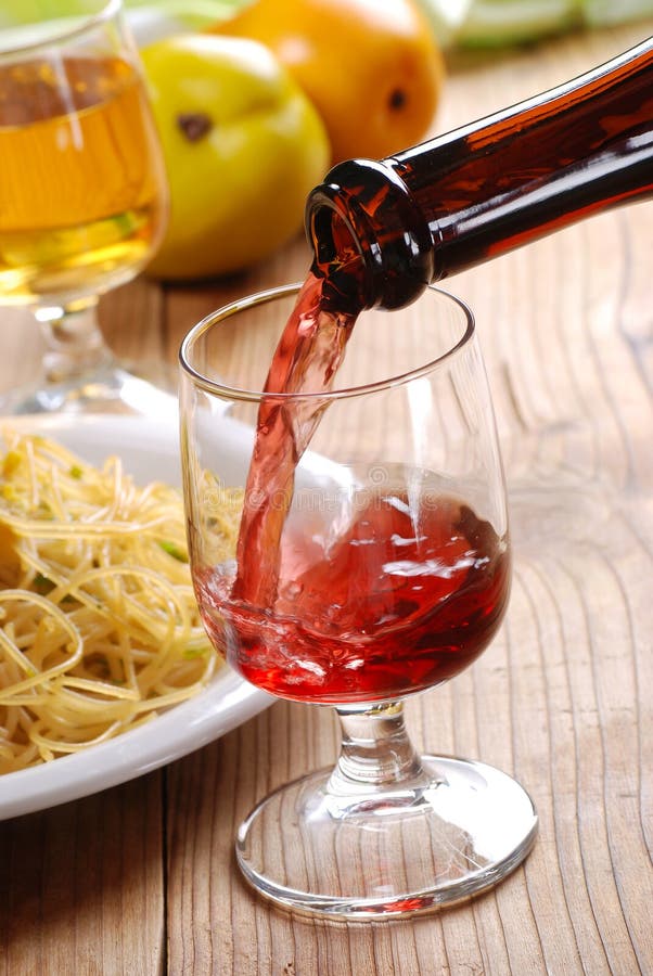Pour the wine stock image. Image of wineglass, glass 45252881