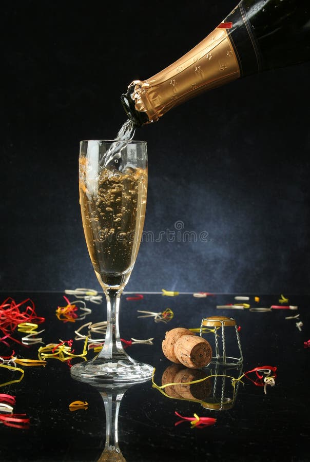 Pouring a champagne flute stock photo. Image of bottle 1456632