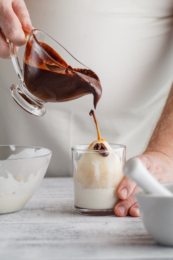 Pouring Chocolate Sauce Onto Ice Cream Stock Image Image of decorating, chef 79378603