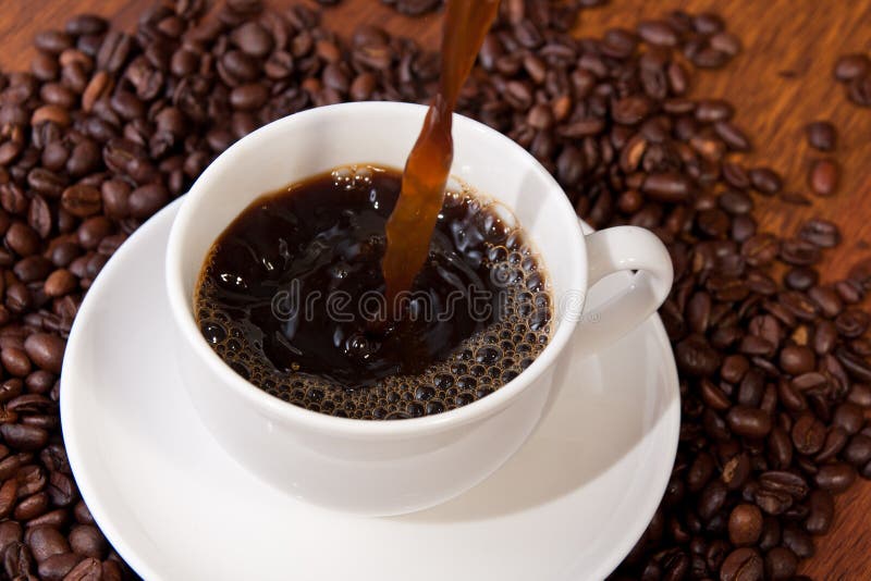 Pouring hot coffee stock photo. Image of pouring, bubble 29189290