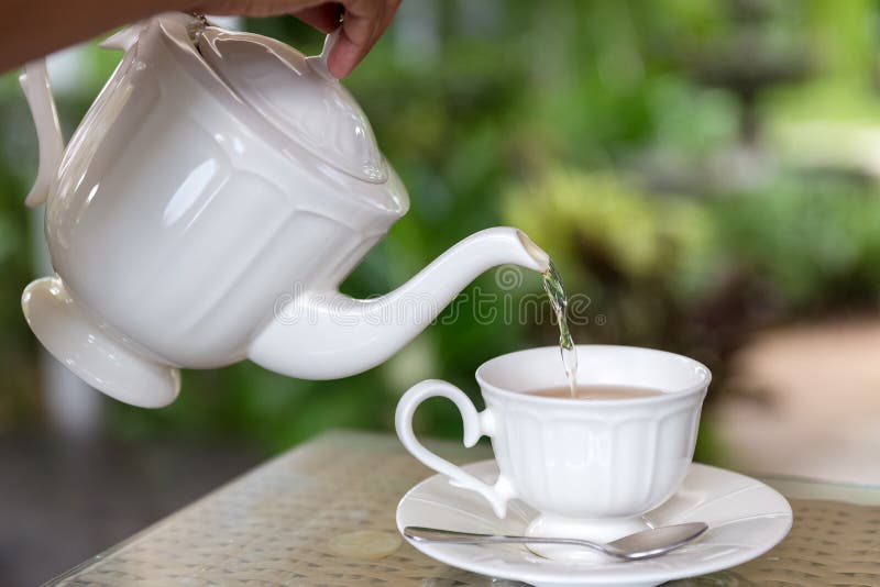 Pouring hot tea stock image. Image of tradition, english 127130709