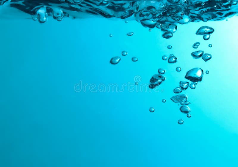 Pouring Made a Splash of Blue Waves Under the Water and Bubbles Flowing