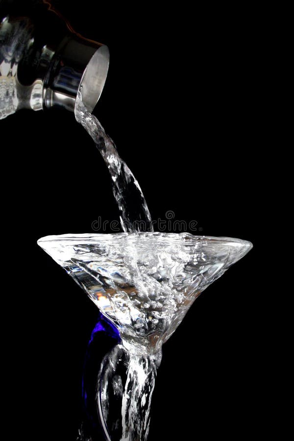 Pouring a martini stock photo. Image of water, spill, drink 2060564