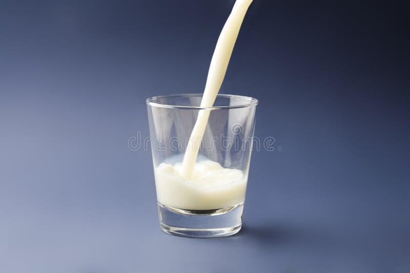 Pouring milk royalty free stock image