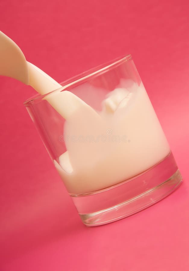 Pouring milk into glass