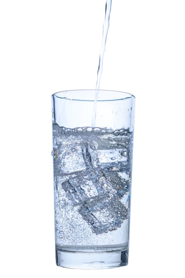 Pouring mineral water in transparent glass with ice and bubbles isolated over white background, close up