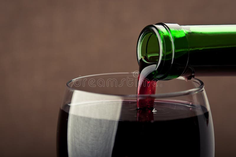Pouring red wine stock image. Image of crystal, gourmet 23571489