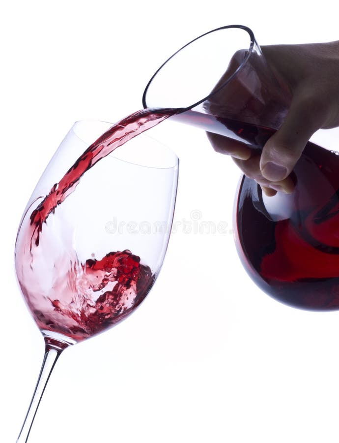 Pouring Red Wine from a Decanter