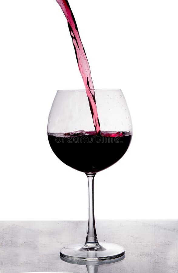 Pouring red wine royalty free stock photography