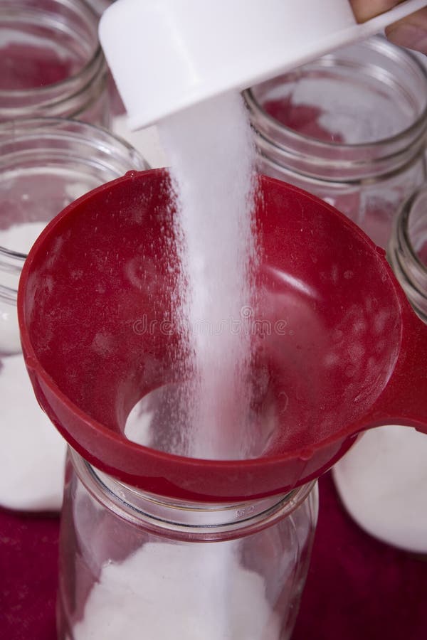 Pouring Sugar in Jar from Measuring Cup Stock Photo Image of bottle