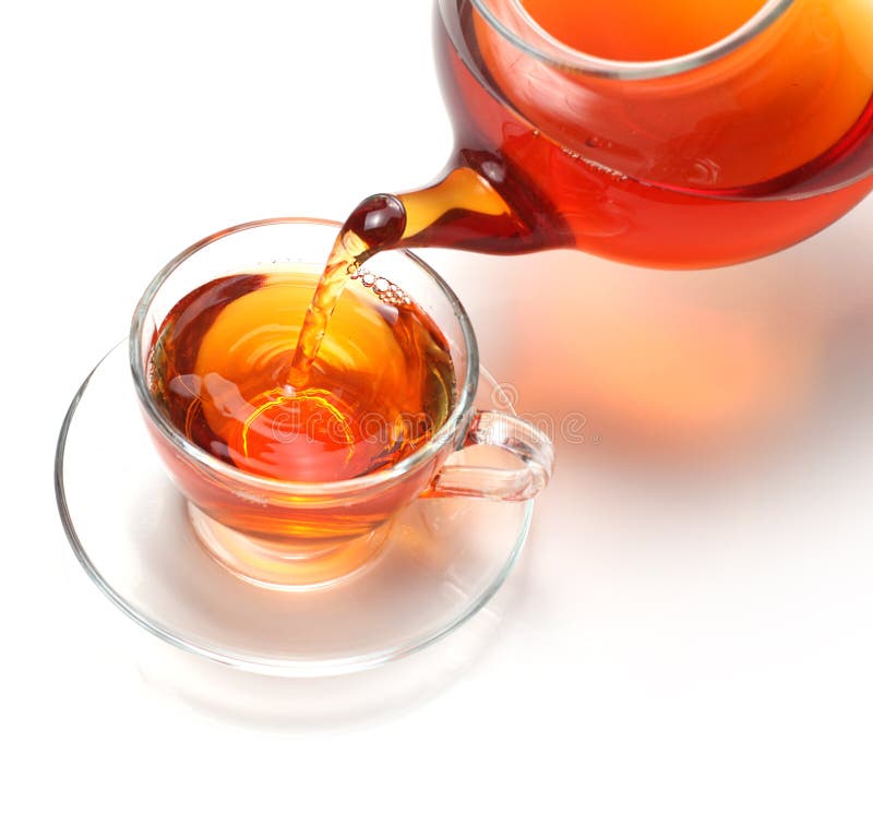 Pouring tea to a teacup stock photo. Image of teapot 15240604