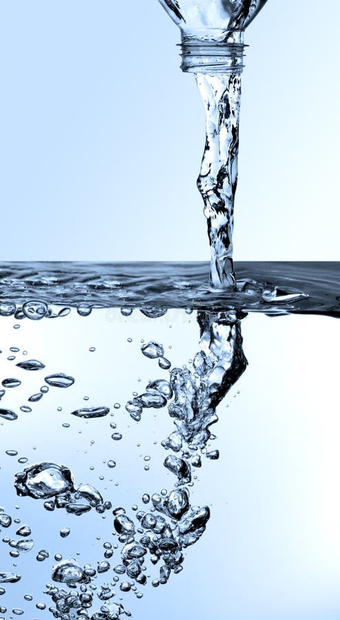 Pouring Water from a Bottle Stock Photo - Image of bottle, pouring: 2595394