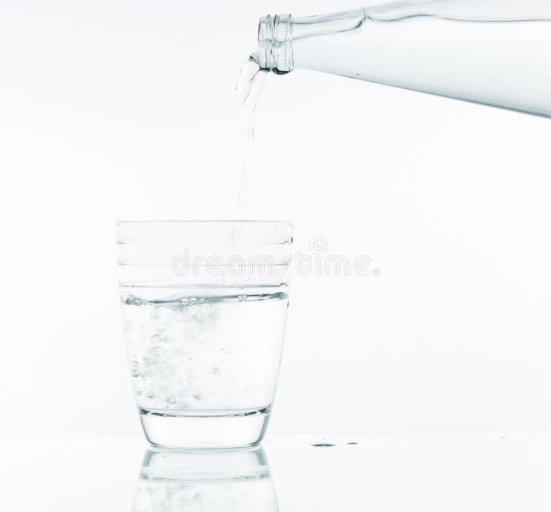 Pouring water on glass stock image. Image of isolate 40195471
