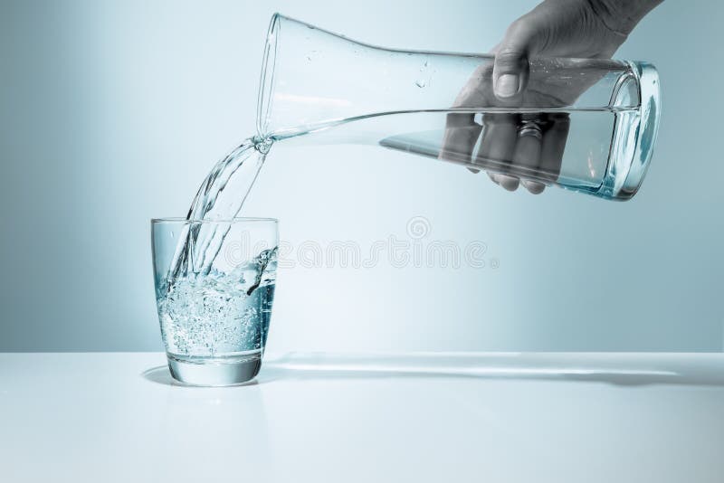 360+ Pitcher Glass Pouring Human Hand Stock Photos, Pictures & Royalty-Free  Images - iStock