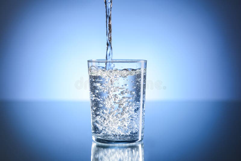 Pouring of Water in Glass on Table Stock Photo Image of refreshment
