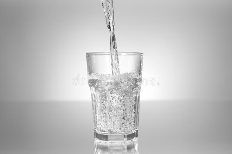 Pouring of Water in Glass on Table Stock Image Image of filtered