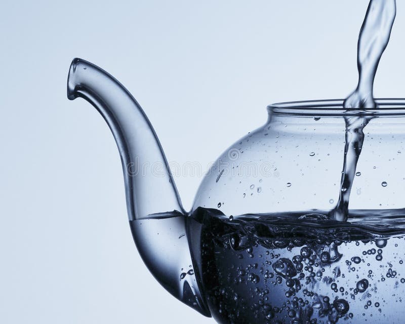 Pouring Water Into A Teapot Stock Photography Image 16932072