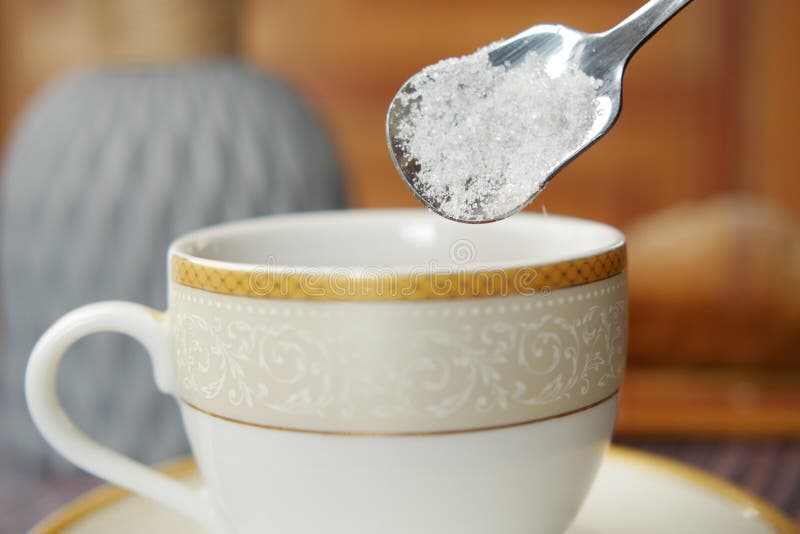 Pouring White Sugar in a Coffee Cup Stock Image Image of galss