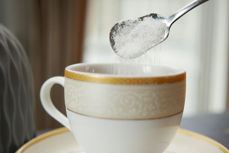 Pouring White Sugar in a Coffee Cup , Stock Image Image of energy