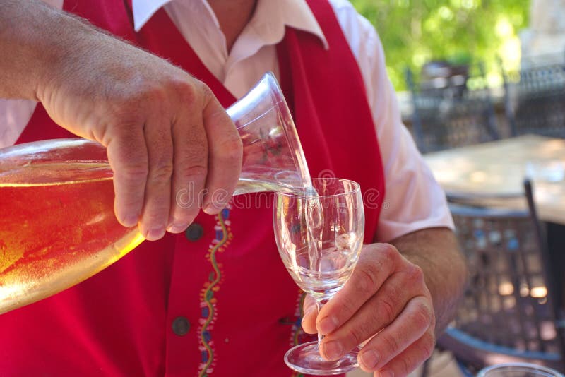 Pouring wine stock photo. Image of pouring, person, glass 259876372