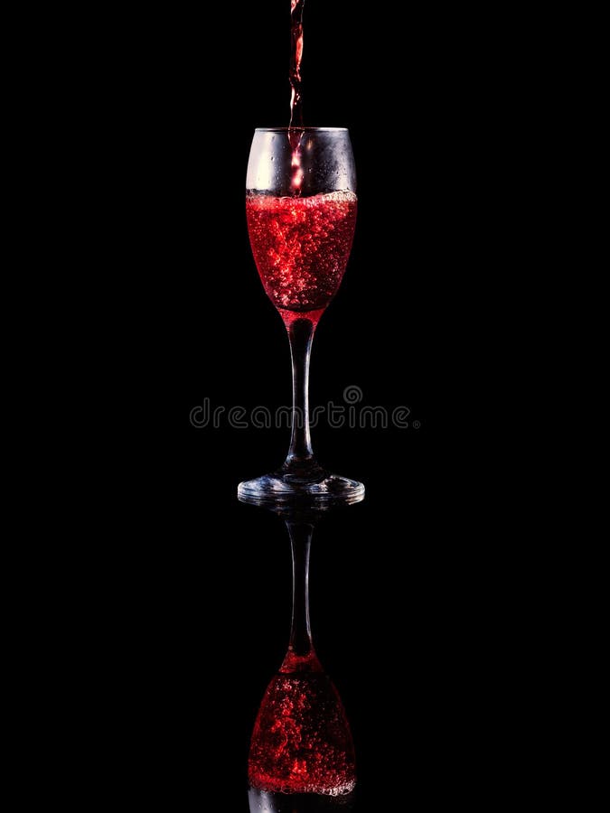 Pouring wine into an elegant glass royalty free stock photos