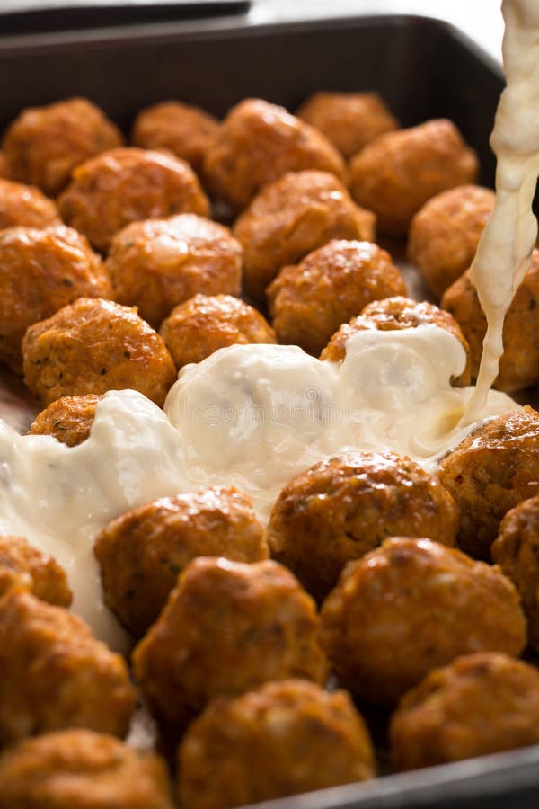 Pouring Yogurt on the Minced Meat Meatballs Ready for Baking Stock Photo Image of mince