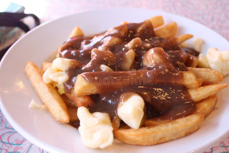 Poutine, canadian cuisine very unhealthy traditional Canadian, Quebec, Poutine stock photos Poutine, canadian cuisine very unhealthy traditional Canadian, Quebec, Poutine stock photos