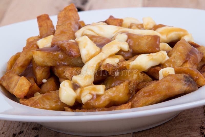 Poutine quebec meal with french fries royalty free stock images
