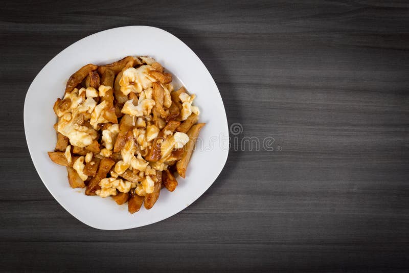 Poutine quebec meal with french fries royalty free stock photo