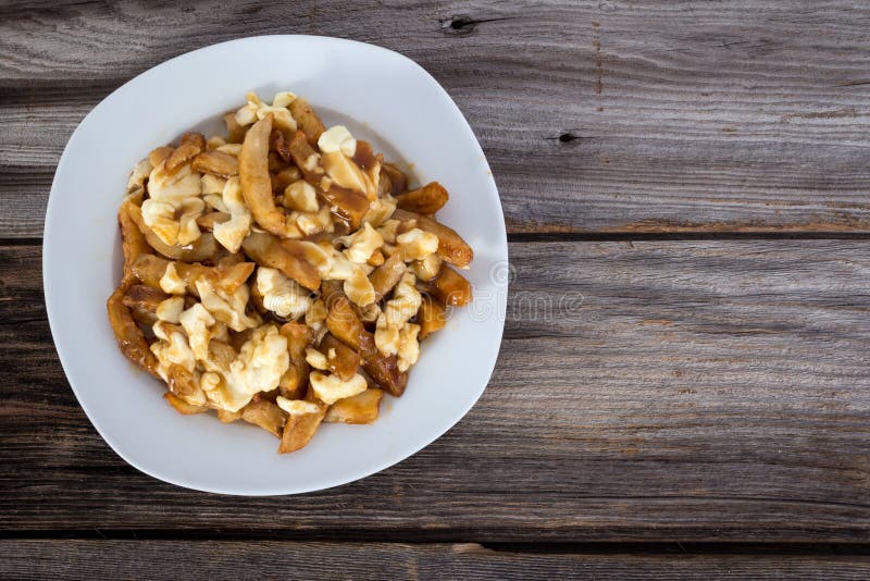 Poutine quebec meal with french fries royalty free stock images