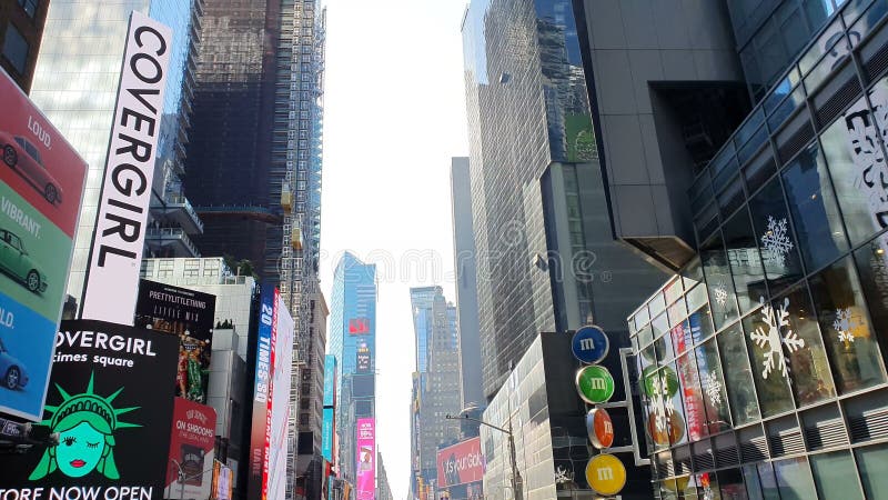 POV of Times Square. Is featured with Broadway Theaters and LED signs as a symbol of New York City and the USA, N