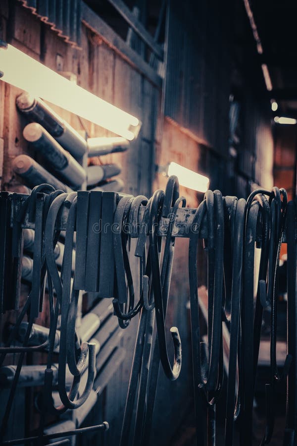 Powder coating hooks stock image. Image of powder, hand 227907535