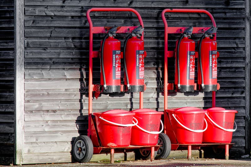 Powder Fire Extinguisher and Red Fire Buckets for Emergency Use Stock