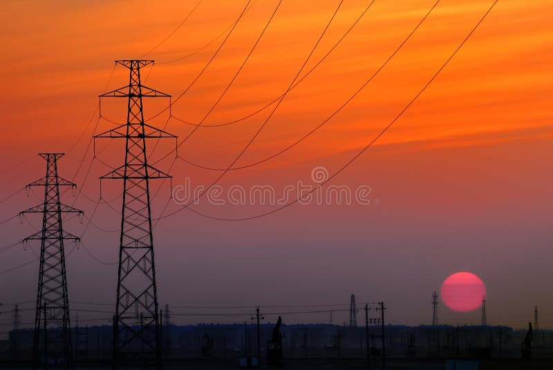 Power line tower sunset