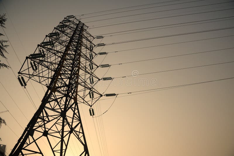 Power lines at sun rise royalty free stock images