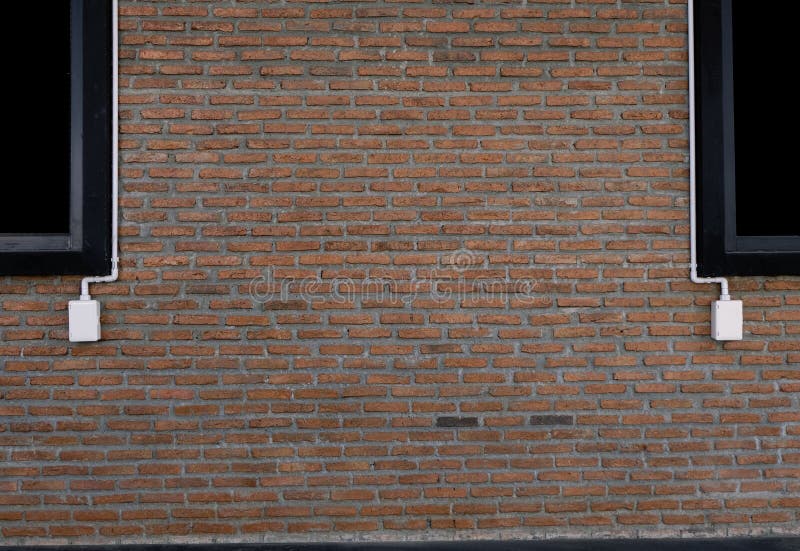 Power Outlets on the Brick Wall Vertical Orientation. Stock Image