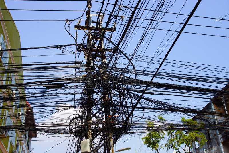 Power Pole with Chaotic Electricity Cables in Kathmandu Nepal Stock